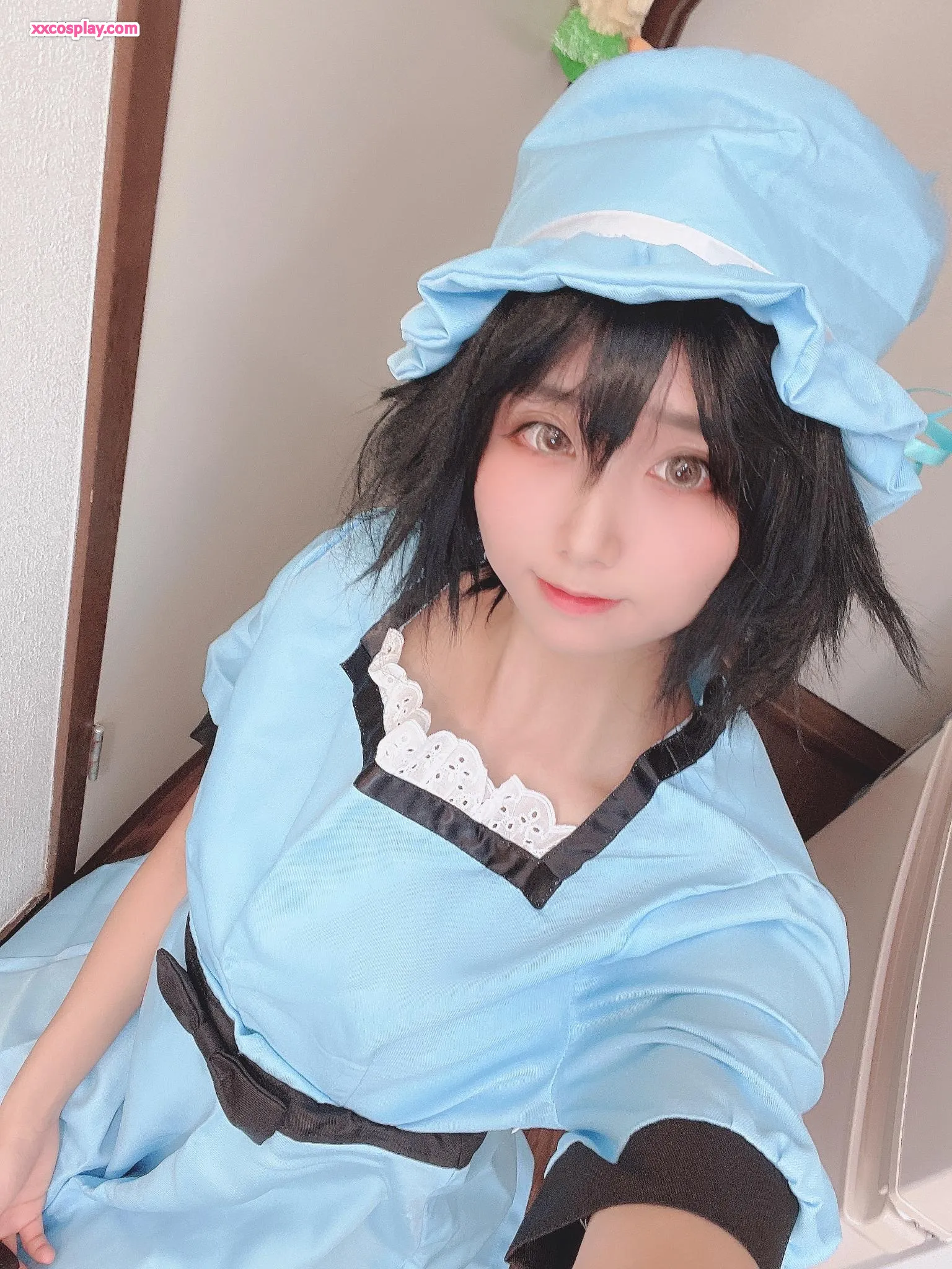 Yanagimaru as Mayuri Shiina: Charming Blue Attire